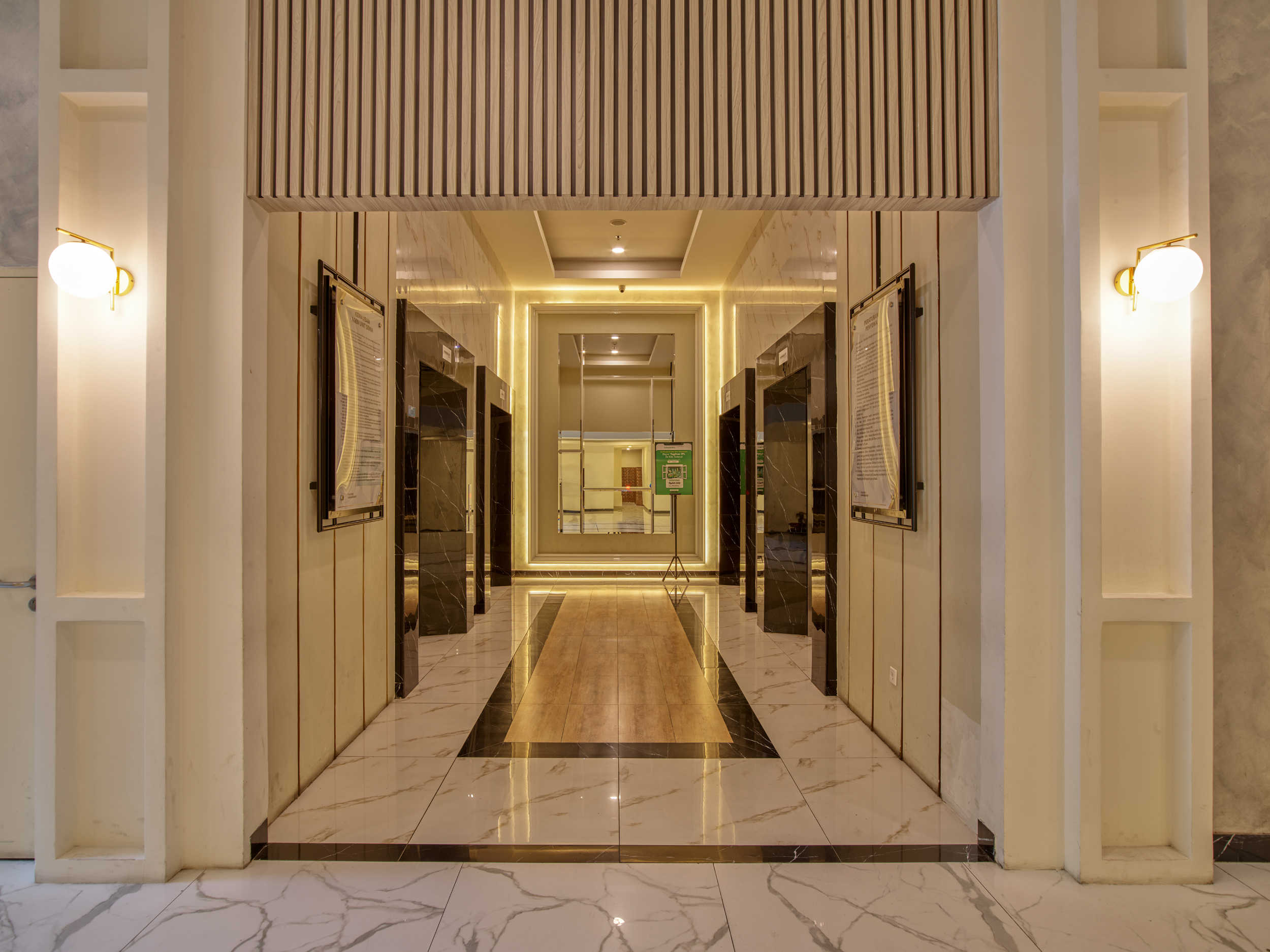 Area Lift Modern di VidaView Apartemen Makassar